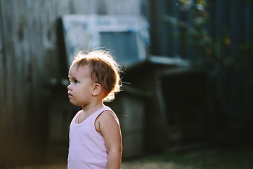 Image showing Child playing in backyard