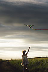 Image showing Anonymous girl with kite