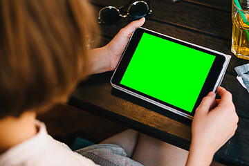 Image showing Crop woman posing with tablet