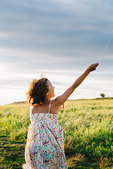 Image showing Anonymous girl with kite