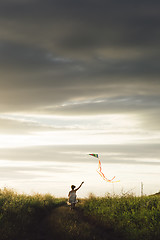 Image showing Anonymous girl with kite