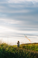Image showing Anonymous girl with kite