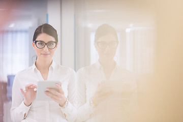 Image showing Business Woman Using Digital Tablet in front of startup Office