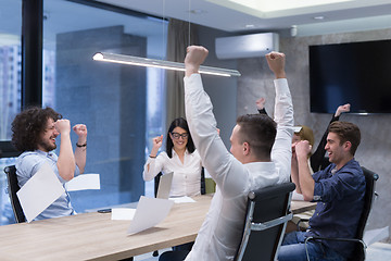 Image showing startup Group of young business people throwing documents