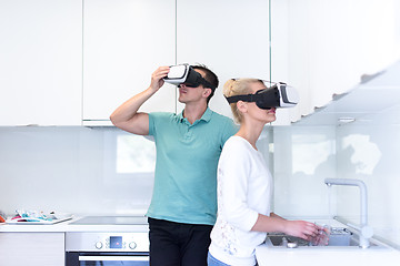 Image showing young couple using VR-headset glasses of virtual reality