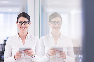 Image showing Business Woman Using Digital Tablet in front of startup Office