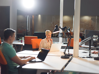 Image showing designers in the night startup office