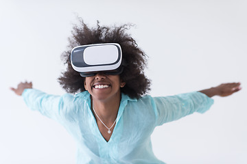 Image showing black girl using VR headset glasses of virtual reality