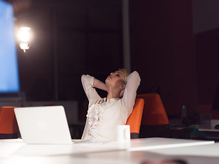 Image showing woman working on laptop in night startup office