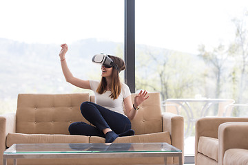 Image showing woman using VR-headset glasses of virtual reality