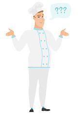 Image showing Caucasian confused chef cook with spread arms.