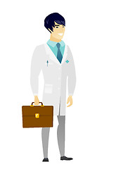 Image showing Asian doctor holding briefcase.