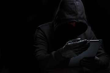 Image showing Photo of thief in black