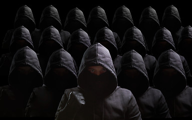 Image showing Many thieves on black background