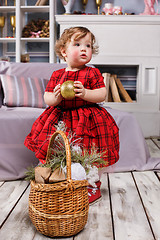 Image showing Little girl standing at studio with christmas decorations