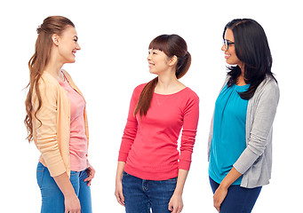 Image showing international group of happy smiling women talking