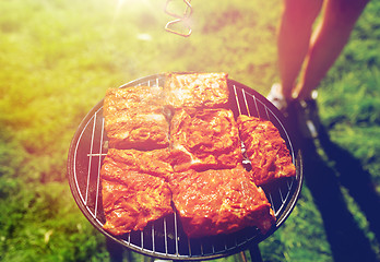 Image showing meat cooking on barbecue grill at summer party