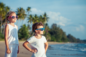 Image showing Happy children playing on the beach at the day time.