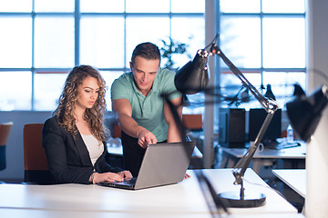 Image showing designers in the night startup office