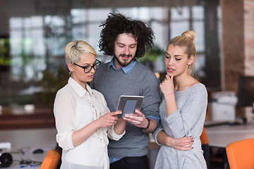 Image showing group of Business People Working With Tablet in startup office