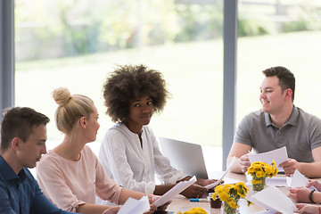 Image showing Multiethnic startup business team on meeting