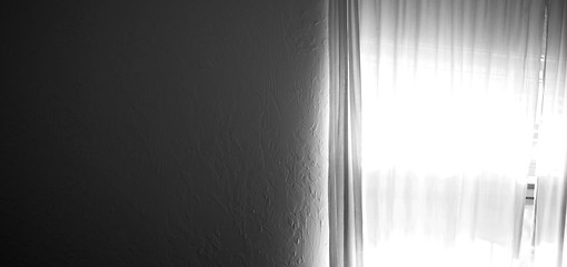 Image showing dark wall with bright window light