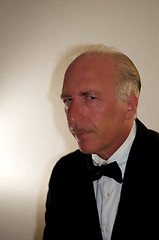 Image showing portrait of professional mature man in tuxedo