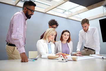 Image showing business team discussing house project at office