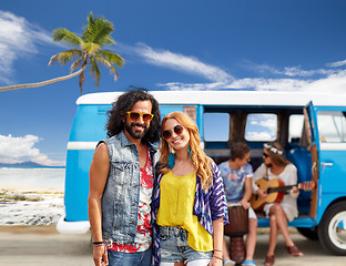 Image showing happy hippie couples and minivan on beach