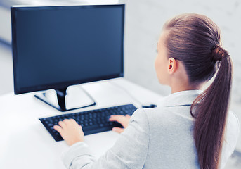 Image showing businesswoman with computer in office