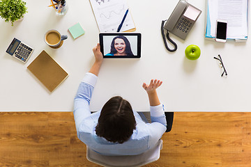 Image showing hands of businesswoman with tablet pc at office