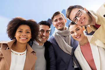 Image showing group of happy people or friends on city street