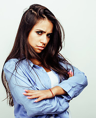 Image showing young happy smiling latin american teenage girl emotional posing on white background, lifestyle people concept 