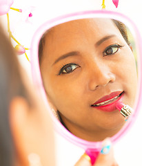 Image showing Applying Lipstick In Mirror Shows Beauty And Makeup