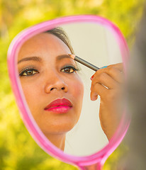 Image showing Applying Eyebrows Makeup In Mirror Shows Cosmetics