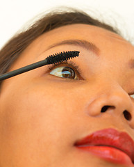Image showing Girl Applying Mascara On Her Eyelashes Uses Cosmetics