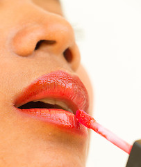 Image showing Lipgloss On Lips To Make Asian Girl Beautiful