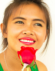 Image showing Smiling Girl With Rose Shows Joyful And Healthy