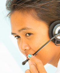 Image showing Help Desk Operator Girl Shows Call Center Assistance