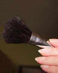 Image showing makeup brush in hand