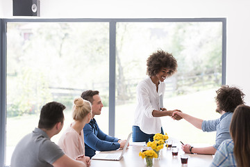 Image showing Multiethnic startup business team on meeting