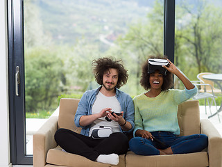 Image showing Multiethnic Couple using virtual reality headset