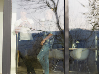 Image showing young couple enjoying morning coffee