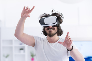 Image showing man using VR-headset glasses of virtual reality