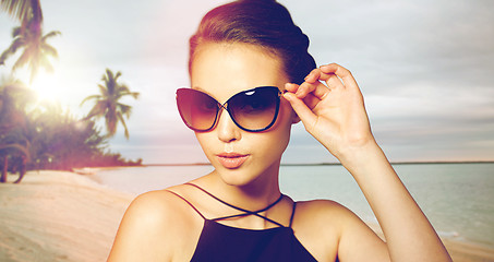 Image showing beautiful young woman in elegant black sunglasses