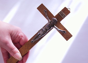 Image showing cross in hand