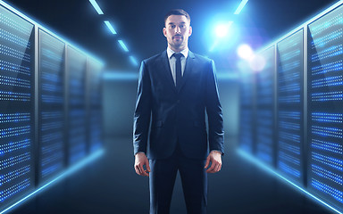 Image showing businessman over server room background