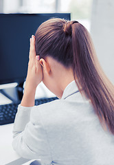 Image showing stressed woman with computer