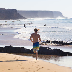Image showing Active people on El Cotillo beach, Fuerteventura, Canary Islands, Spain.