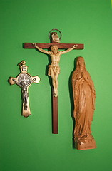 Image showing two different crucifixes and Mary figurine